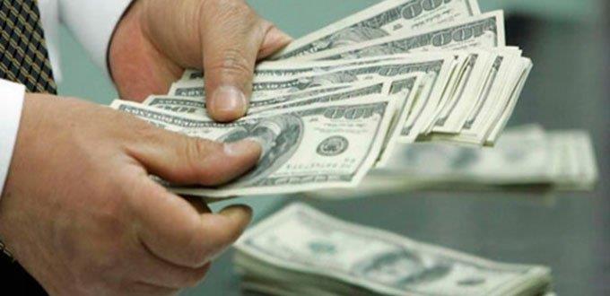 Dólar cierra con marginal descenso, se vende en $20.30 en bancos