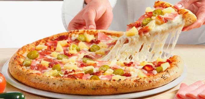 Dominos sale a las calles de EEUU, pero para tapar baches