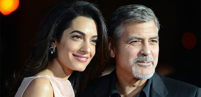George y Amal Clooney apoyan a niños migrantes