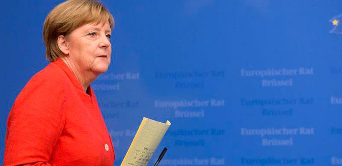 Merkel logra acuerdo sobre migrantes con 14 países de la Unión Europea