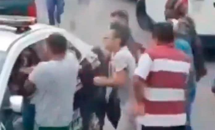 Difunden imágenes de momento en que joven es baleado durante riña entre policías y civiles en Cuajimalpa