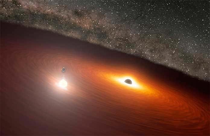 Concepción artística del sistema binario de agujeros negros en OJ 287 / Imagen: NASA - Tata Institute of Fundamental Research