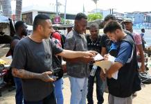 Migrantes en Tapachula piden protección para salir en viacrucis