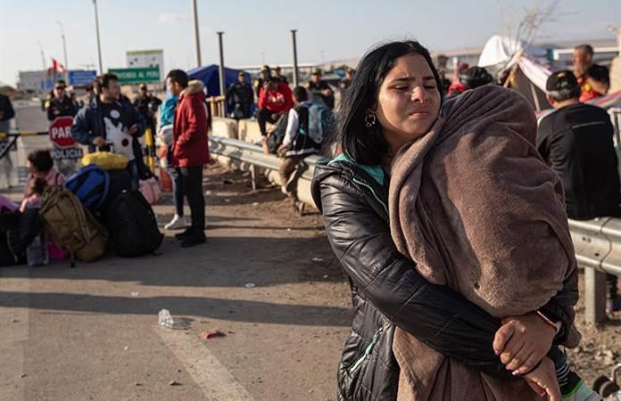 Miedo, frío, xenofobia y sueños rotos se agolpan en la frontera de Chile