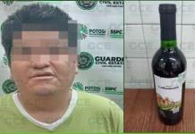 Ladrón es sorprendido robando botella de vino