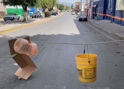 Bloquean avenida Juárez en exigencia de agua