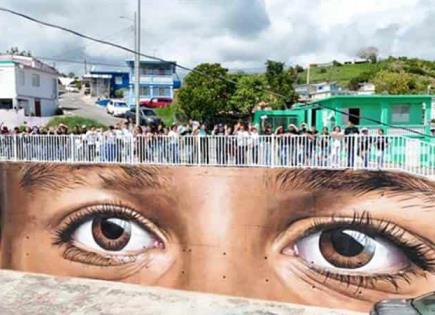 Muralistas de España y Argentina embellecen cerro en Puerto Rico azotado por la violencia
