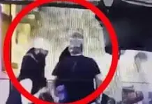 Esc&aacute;ndalo en Ecatepec: servidores p&uacute;blicos pisparan armas al aire