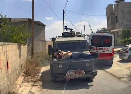 Joven palestino atado a jeep militar en Israel