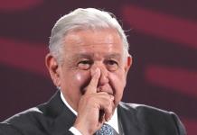 Vinculado a traficantes de influencias en PJF, el abogado que lanzó botella: AMLO