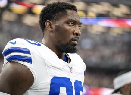 DeMarcus Lawrence y Micah Parsons fuera por lesiones