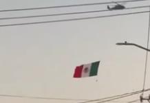 Helicóptero ondea bandera nacional en cielo de Culiacán