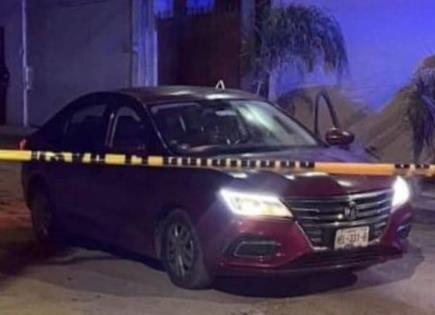 Hallan cuerpo de joven con disparos al interior de auto en Tierra Blanca