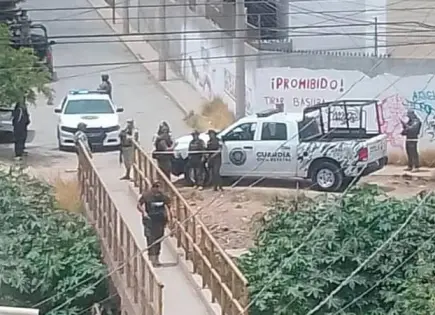 Hallan colgada a madre de niño estrangulado Hallan colgada a madre de niño estrangulado