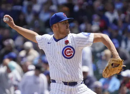Taillon y Tucker ayudan a los Cachorros en ascenso a vencer 3-1 a los Rockies