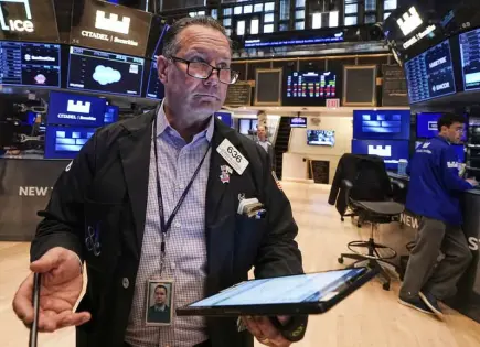Wall Street se acerca a récords tras alza en precios del petróleo