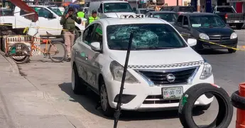 En riña, atrapan a taxista involucrado en atracos