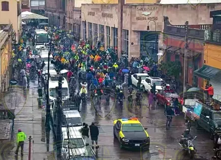 Lluvia y rodada ciclista complican vialidad en la capital