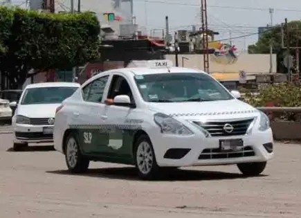 Sancionarán a taxis que suban tarifas por lluvias