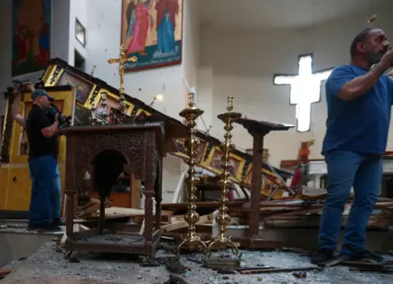 Atacante suicida mata al menos a 13 personas en iglesia cerca de Damasco