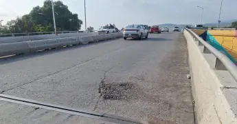 Fotos | Indagan hundimiento en puente de avenida Juárez