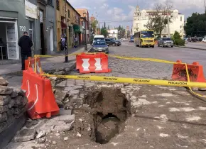 Fotos | Reportan más socavones tras lluvias en la capital