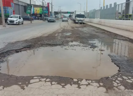Fotos | Lluvias dejan severo deterioro en camino al Ejido La Libertad