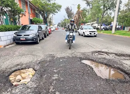 Por lluvias, Ayuntamiento justifica pausa en bacheo