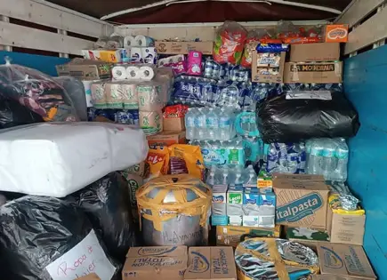 Inicia entrega de primer apoyo a damnificados por lluvias en México