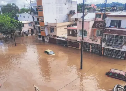 Veracruz exenta de impuestos a damnificados por lluvias e inundaciones