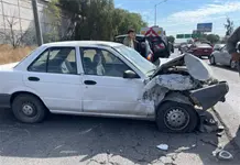 Fotos | Da&ntilde;os en tres veh&iacute;culos por choque en lateral de la 57