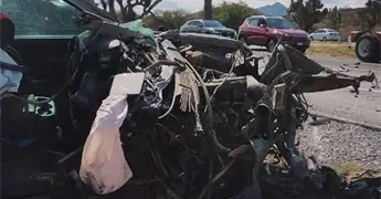 Dos muertos y un menor lesionado, en choque en la &acute;57