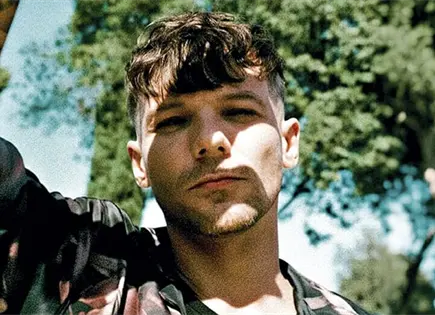 LOUIS TOMLINSON ANUNCIA "IMPOSTER"