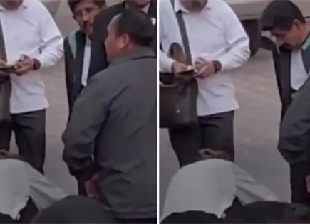 Captan momento en que limpian zapatos a ministro Hugo Aguilar