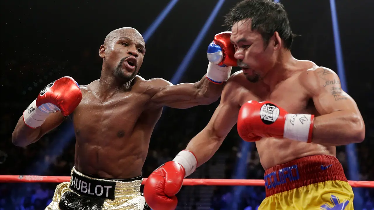 Mayweather y Pacquiao pactan revancha para septiembre en Las Vegas