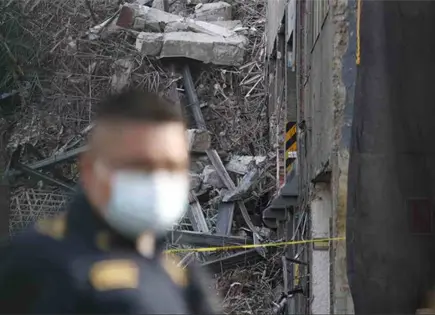 Localizan segundo cuerpo tras colapso de edificio
