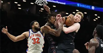 Knicks ganan a Nets en el derbi de NY