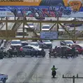 Video | Repartidores bloquean por varias horas Eje Vial y Universidad