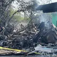 Fotos | Trailero fallece al estrellarse en vivienda de la 57