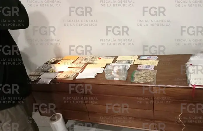 Desmantelan red de lavado de dinero y falsificación