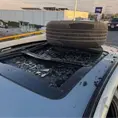 Llanta sale volando y daña SUV en Periférico Poniente Llanta sale volando y daña SUV en Periférico Poniente