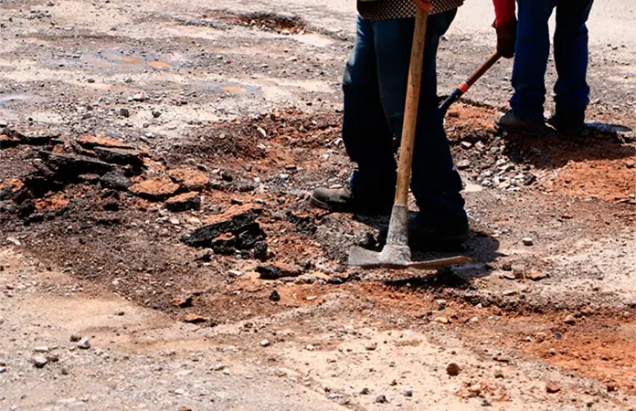 Suspenden bacheo en Pozos por lluvias