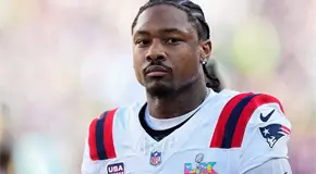 Stefon Diggs firma con Commanders