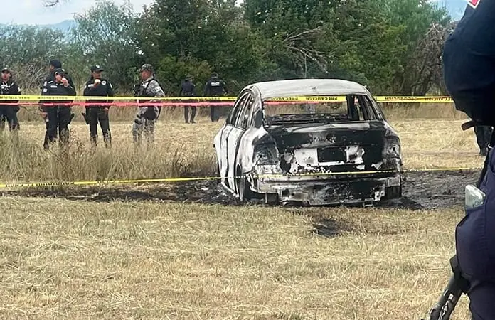 Queman taxi con cuerpo, en Maravillas Queman taxi con cuerpo, en Maravillas