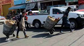 Nacomenudistas en Abastos se hacen pasar por cargadores